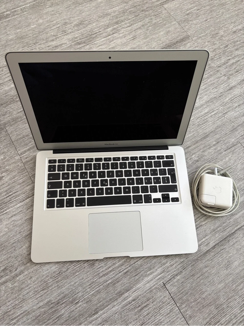 Apple Laptop in Silver with Charger Cord